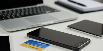 2025 Guide to Manufacturer Warranties for US Electronics Modern electronics with warranty card illustration